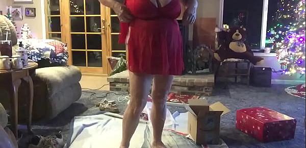  Wife opening a Christmas present 2019